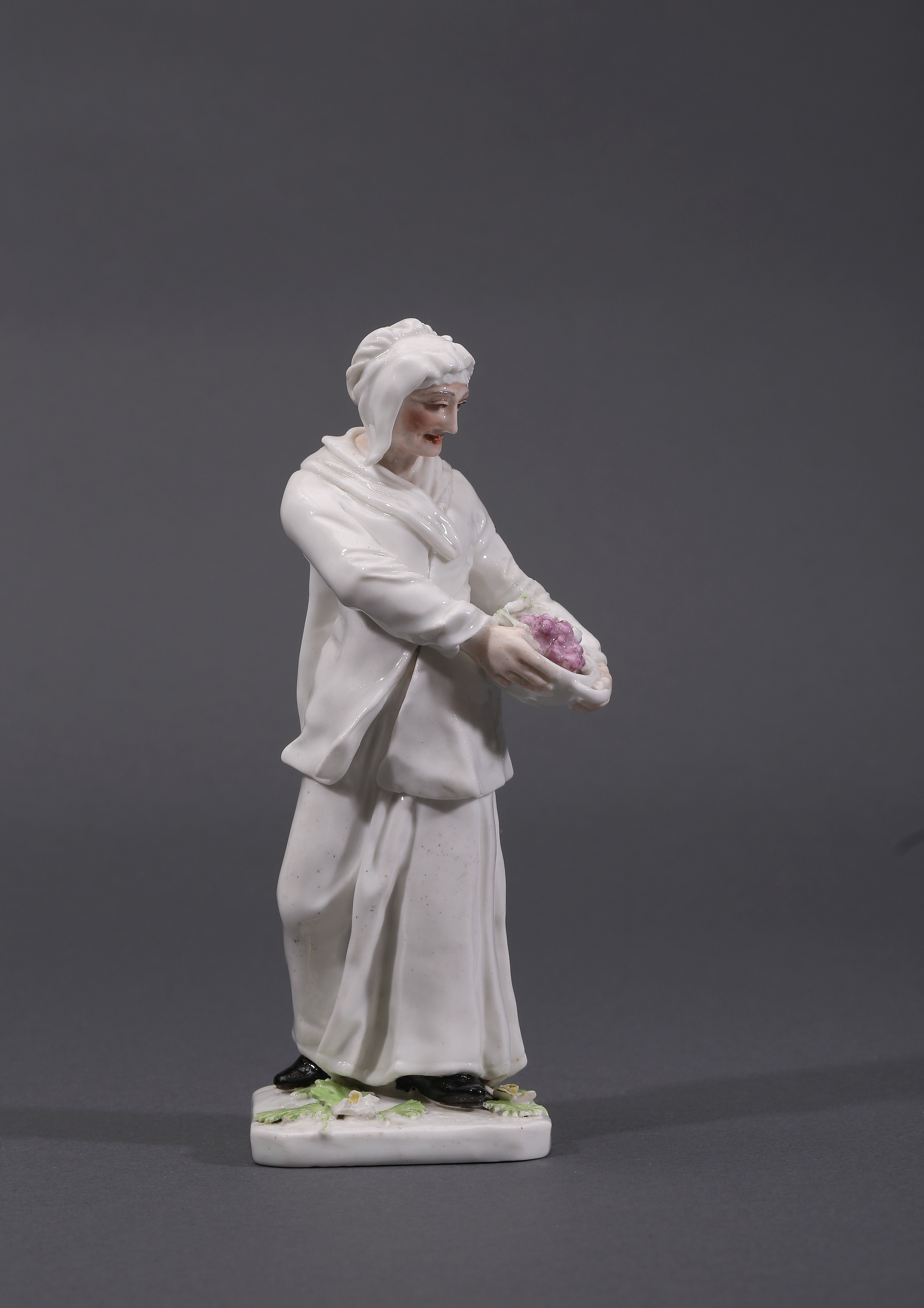 CHELSEA FIGURE OF A 'BEGGARWOMAN', MODELLED BY JOSEPH ...