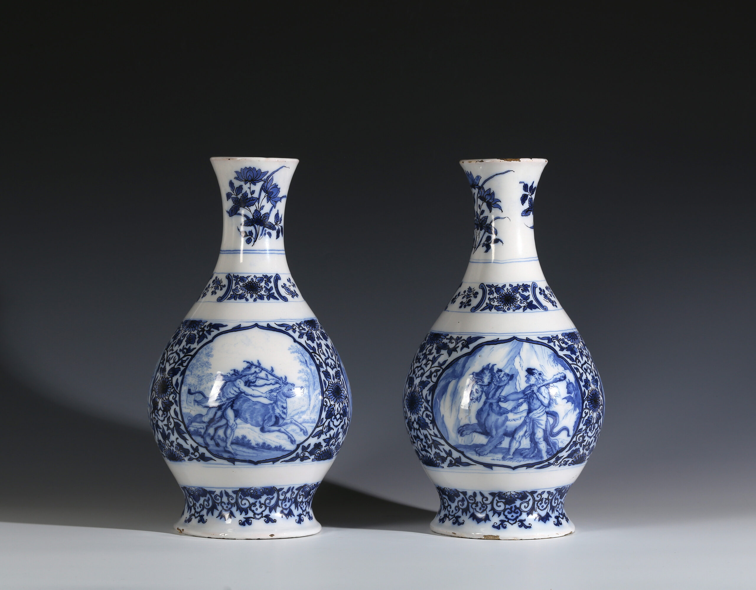 A PAIR OF DUTCH DELFT ‘HOPPESTEYN’ VASES