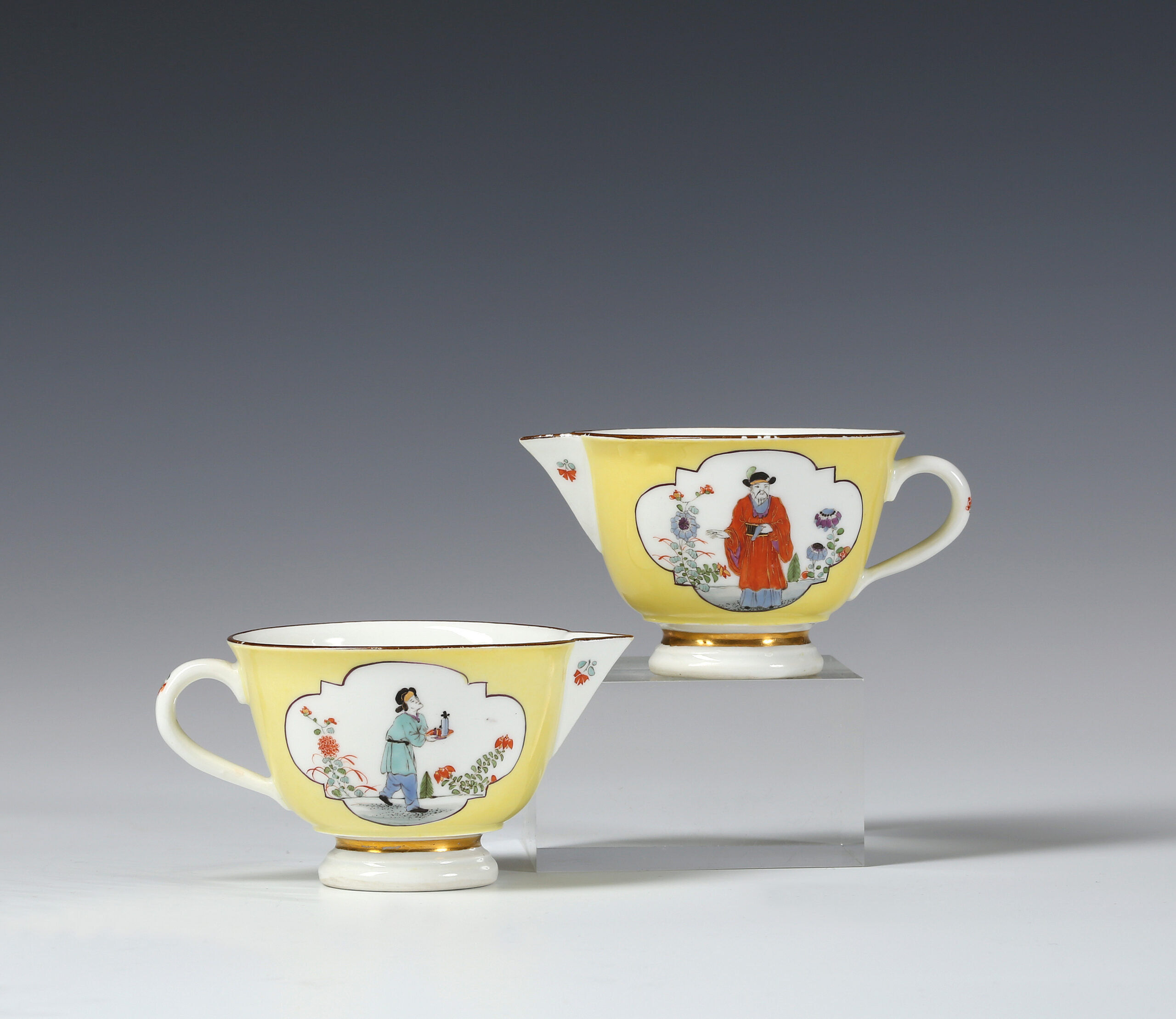 TWO MEISSEN YELLOW-GROUND POURING CUPS
