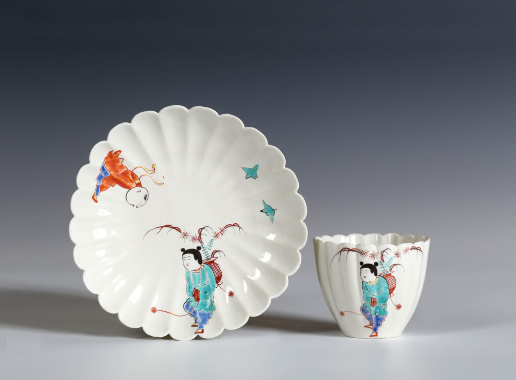 A CHANTILLY BEAKER AND SAUCER