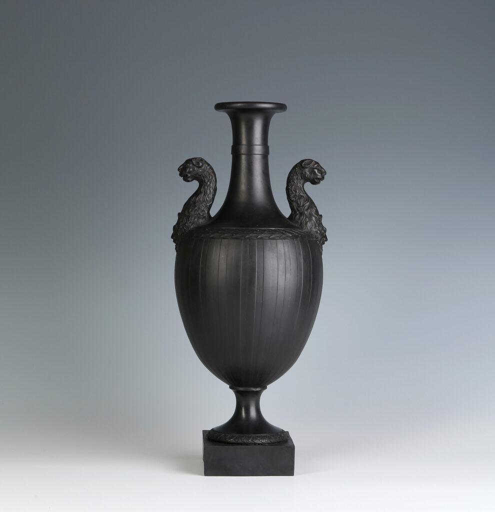 A WEDWOOD AND BENTLEY BLACK BASALT LION HEAD HANDLED VASE
