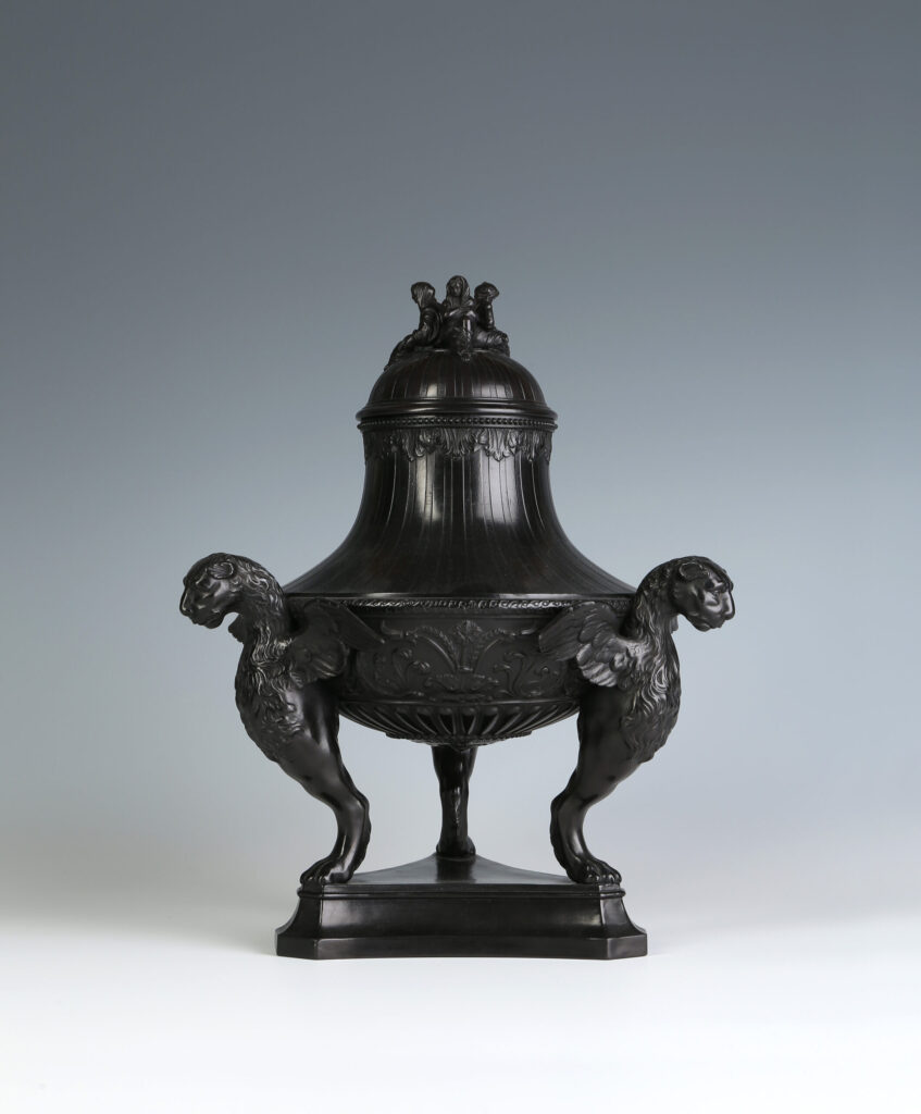A WEDGWOOD BLACK BASALT TRIPOD AMPHORA VASE AND COVER